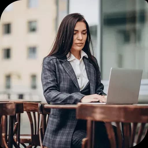 Professional woman working at a cafe