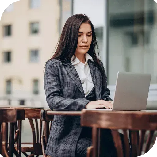 Professional woman working at a cafe